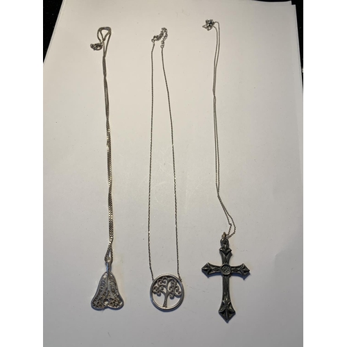 552 - THREE SILVER NECKLACES WITH PENDANTS