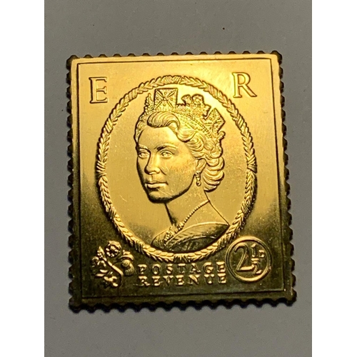 557 - A SILVER GILT 2 1/2D STAMP