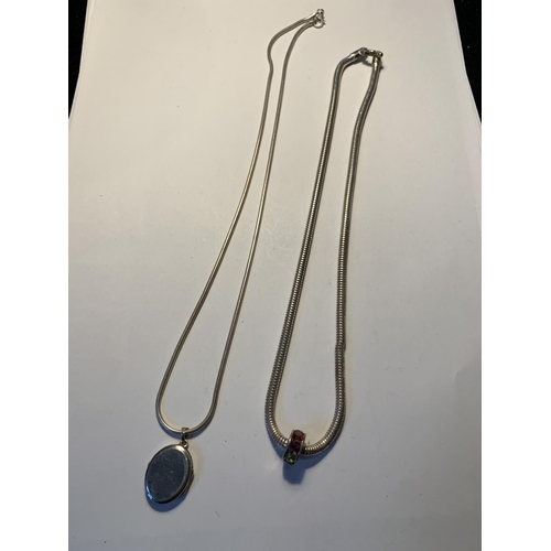 564 - TWO SILVER NECKLACES WITH PENDANTS