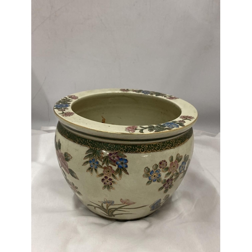 14 - AN ORIENTAL PLANTER WITH FLOWER AND FISH DECORATION