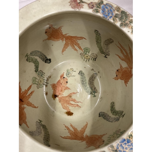 14 - AN ORIENTAL PLANTER WITH FLOWER AND FISH DECORATION