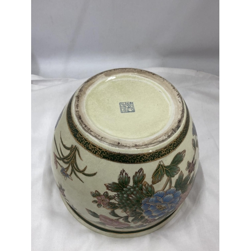 14 - AN ORIENTAL PLANTER WITH FLOWER AND FISH DECORATION