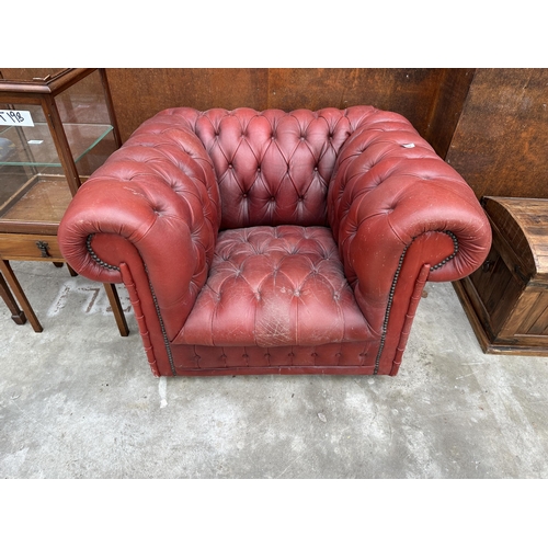 2508 - AN OXBLOOD BUTTONED LEATHER ARMCHAIR