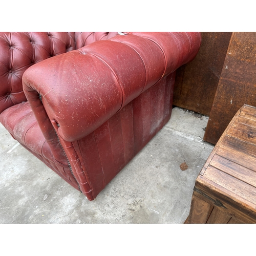 2508 - AN OXBLOOD BUTTONED LEATHER ARMCHAIR