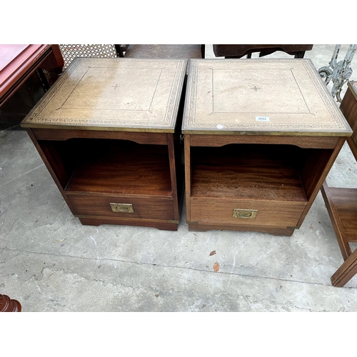 2682 - A PAIR OF REPRODUCTION LAMP TABLES WITH INSET LEATHER TOPS, BRASS RIM AND MILTIARY STYLE HANDLES TO ... 