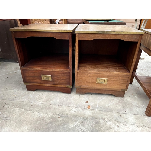 2682 - A PAIR OF REPRODUCTION LAMP TABLES WITH INSET LEATHER TOPS, BRASS RIM AND MILTIARY STYLE HANDLES TO ... 