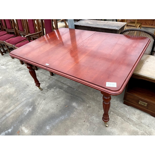 2683 - A VICTORIAN STYLE PULL OUT DINING TABLE ON TURNED AND FLUTED LEGS WITH BRASS CASTERS, 60