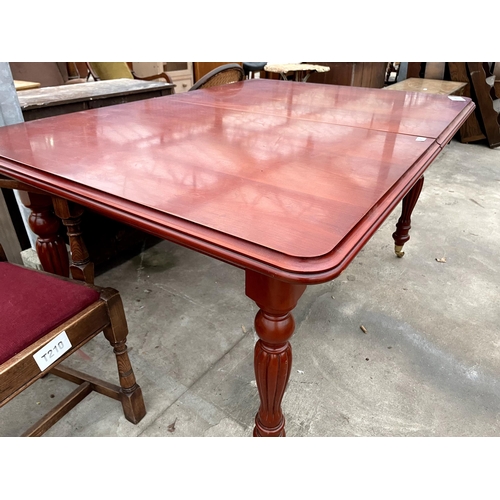 2683 - A VICTORIAN STYLE PULL OUT DINING TABLE ON TURNED AND FLUTED LEGS WITH BRASS CASTERS, 60