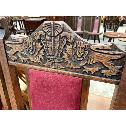 2684 - A SET OF SIX OAK JACOBEAN STYLE DINING CHAIRS, TWO BEING CARVERS. THE CHAIRS BEAR A DEDICATION TO PR... 