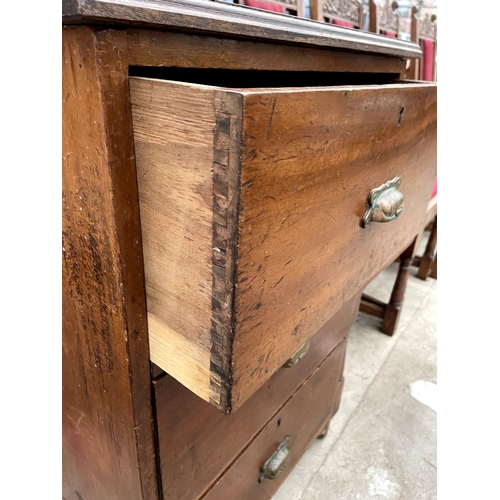 2685 - A LATE VICTORIAN MAHOGANY FILING CHEST OF THREE DRAWERS WITH BRASS SCOOP HANDLES