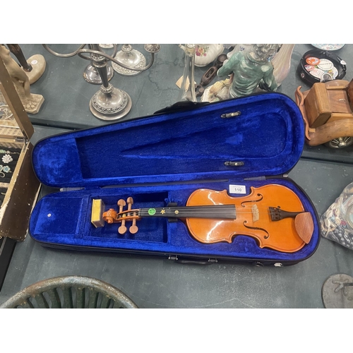 110 - A STENTOR STUDENT 1/4 VIOLIN IN A CASE