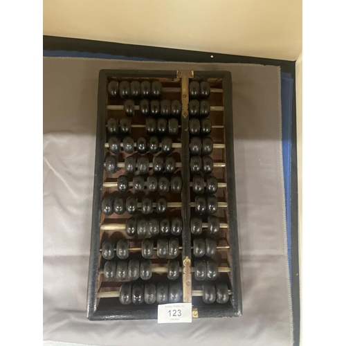 123 - A VINTAGE WOOD AND BRASS ABACUS