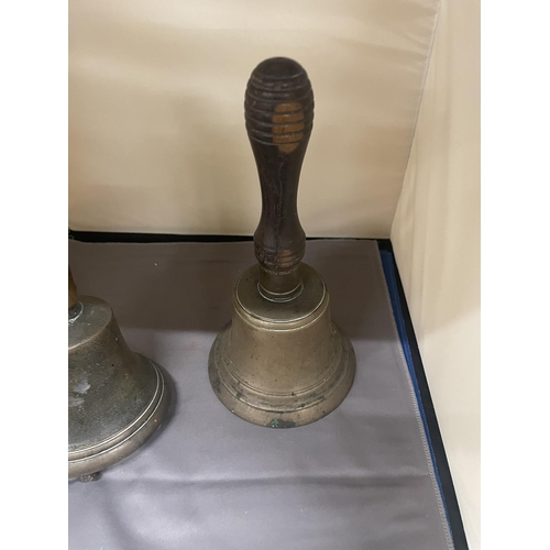 136 - TWO VINTAGE BRASS HANDBELLS WITH WOODEN HANDLES, HEIGHT 27CM