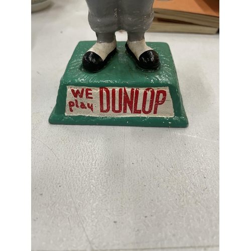 169 - A SOLID CAST HANDPAINTED DUNLOP GOLF BALL CADDIE, HEIGHT 14CM