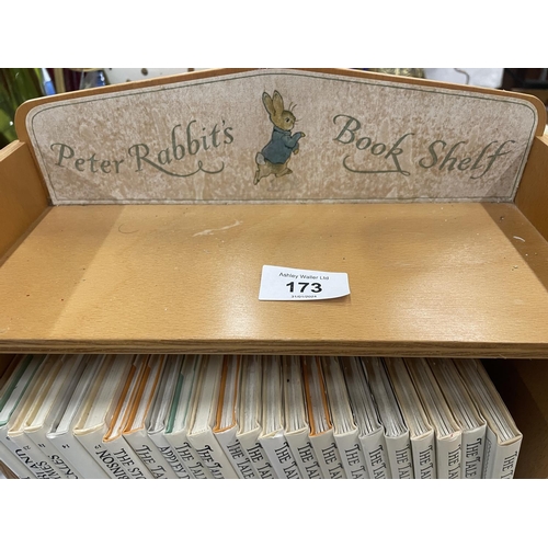 173 - A COLLECTION OF BEATRIX POTTERS CHILDREN' BOOKS PLUS A PETER RABBIT BOOK SHELF - 23 BOOKS IN TOTAL