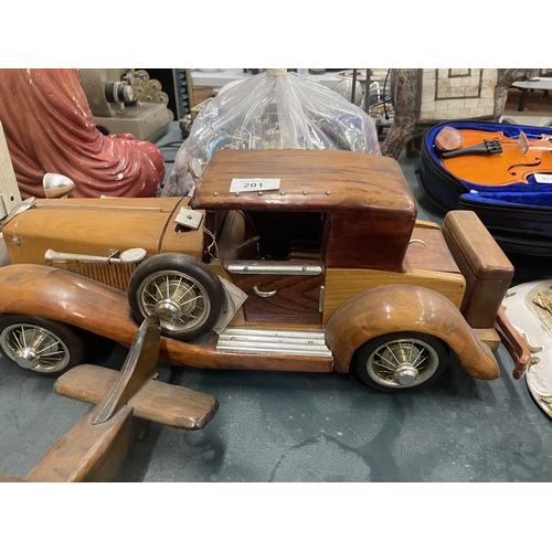 201 - A LARGE WOODEN MODEL OF A CAR PLUS A SMALLER MODEL OF A BI-PLANE