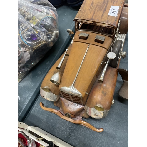 201 - A LARGE WOODEN MODEL OF A CAR PLUS A SMALLER MODEL OF A BI-PLANE