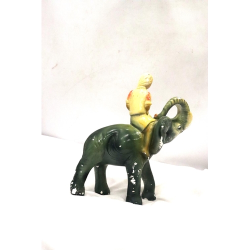 208 - A VINTAGE CHALK FIGURE OF A BOY ON AN ELEPHANT, HEIGHT 30CM, LENGTH APPROX 24CM