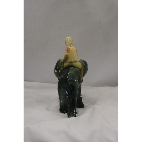 208 - A VINTAGE CHALK FIGURE OF A BOY ON AN ELEPHANT, HEIGHT 30CM, LENGTH APPROX 24CM