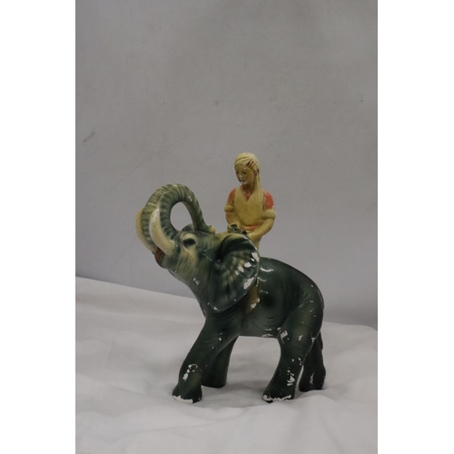 208 - A VINTAGE CHALK FIGURE OF A BOY ON AN ELEPHANT, HEIGHT 30CM, LENGTH APPROX 24CM