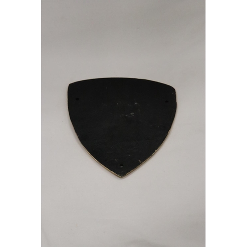 212 - A TRIANGULAR BLACK AND GOLD CAST METAL LAMBORGHINI SIGN, 21CM X 18CM