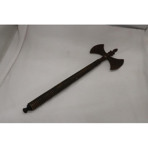 221 - A VINTAGE DOUBLE HEADED GRYPHON AXE