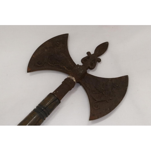 221 - A VINTAGE DOUBLE HEADED GRYPHON AXE