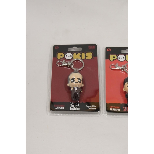 229 - TWO COLLECTABLE 'POKIS' KEYCHAINS TO INCLUDE THE GODFATHER AND SCARFACE