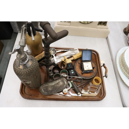 240 - A MIXED VINTAGE LOT TO INCLUDE AN OAK HANDLED TRAY, NAPKIN RINGS, SODA SYPHONS, KNIFE RESTS, FLATWAR... 