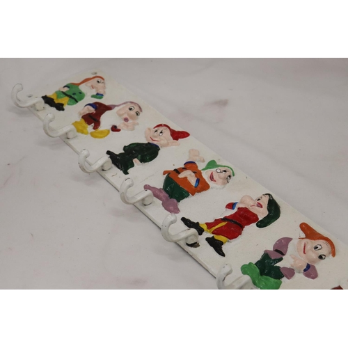 259 - A HEAVY CAST HAND PAINTED 'SEVEN DWARFS' COAT RACK