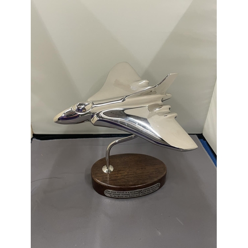 29 - A CHROME VULCAN BOMBER ON A WOODEN BASE