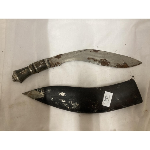 388 - A KUKRI KNIFE AND SCABBARD (BLADE STUCK IN SCABBARD) AND A PLASTIC KNIFE