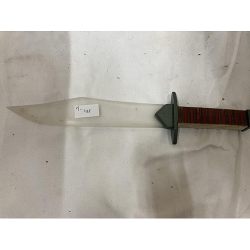 388 - A KUKRI KNIFE AND SCABBARD (BLADE STUCK IN SCABBARD) AND A PLASTIC KNIFE