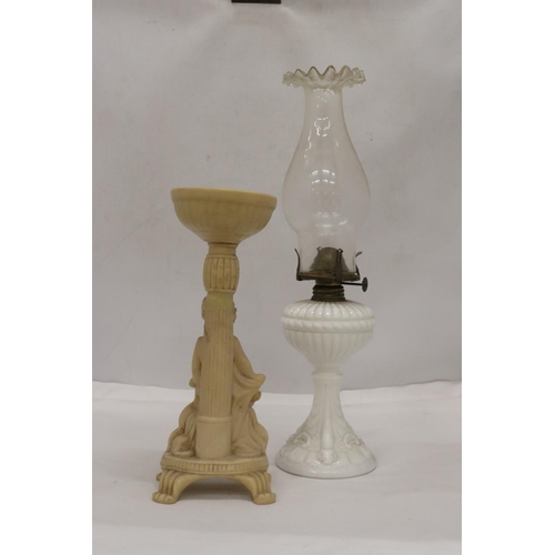 486 - A WHITE BASED GLASS FLUTED SHADE OIL LAMP AND A CHERUB DESIGN FLOWER ARRANGIMG STAND