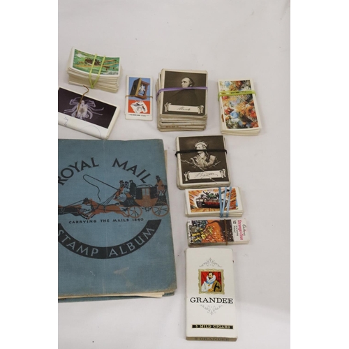 491 - A COLLECTION OF VINTAGE POSTCARDS, TEACARDS, STAMPS ETC