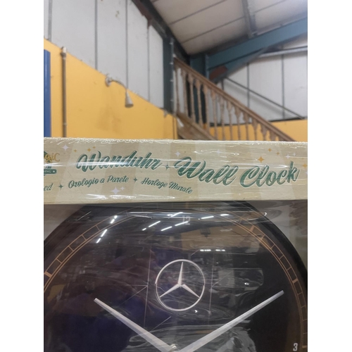 85 - A NEW AND BOXED MERCEDES WALL CLOCK