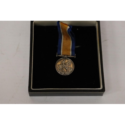 394 - A WORLD WAR I SILVER MINIATURE WAR MEDAL AND RIBBON