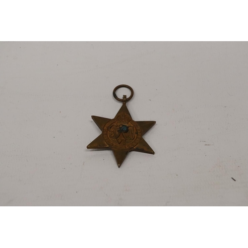 398 - A BRITISH WORLD WAR 11 STAR MEDAL