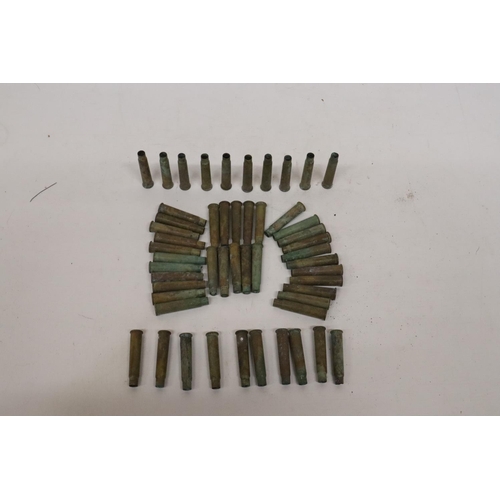 407 - A COLLECTION OF APPROXIMATELY FIFTY-TWO WORLD .303 BRASS SPENT CARTRIDGES