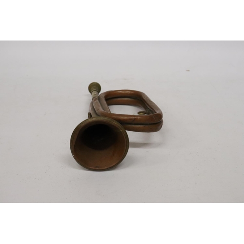 409 - A COPPER AND BRASS BUGLE, LENGTH 28CM