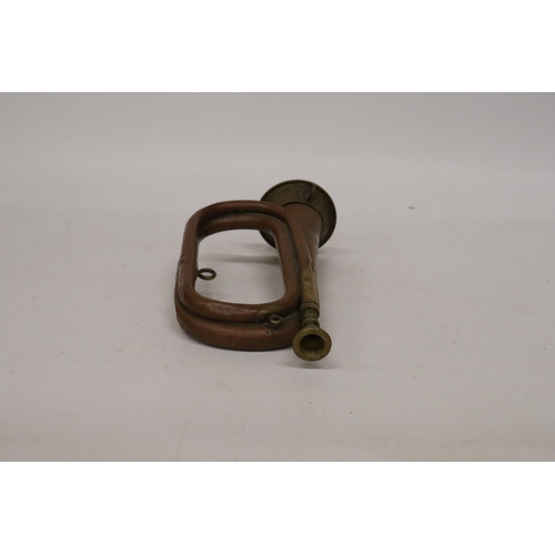 409 - A COPPER AND BRASS BUGLE, LENGTH 28CM