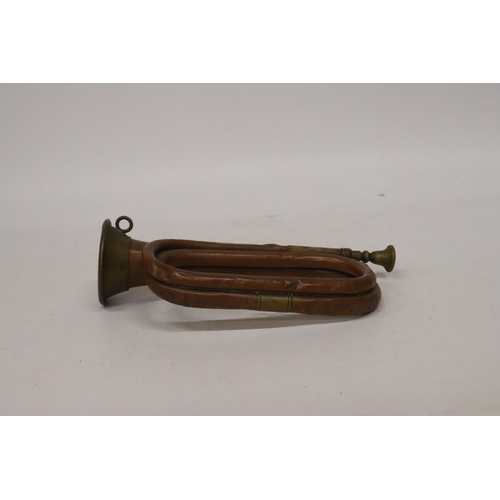 409 - A COPPER AND BRASS BUGLE, LENGTH 28CM