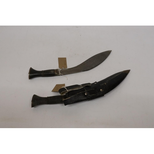 417 - TWO MID 20TH CENTURY KUKRI KNIVES, 28CM BLADES