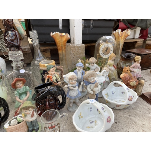 2153 - AN ASSORTMENT OF ITEMS TO INCLUDE AN ANNIVERSARY CLOCK, CERAMIC FIGURES AND DECANTERS ETC