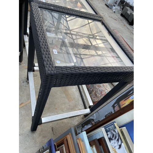 2195 - A TALL RATTAN GARDEN TABLE WITH GLASS TOP