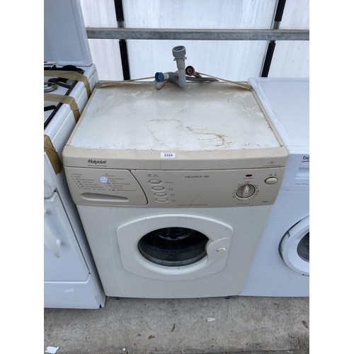 2335 - A CREAM HOTPOINT WASHING MACHINE