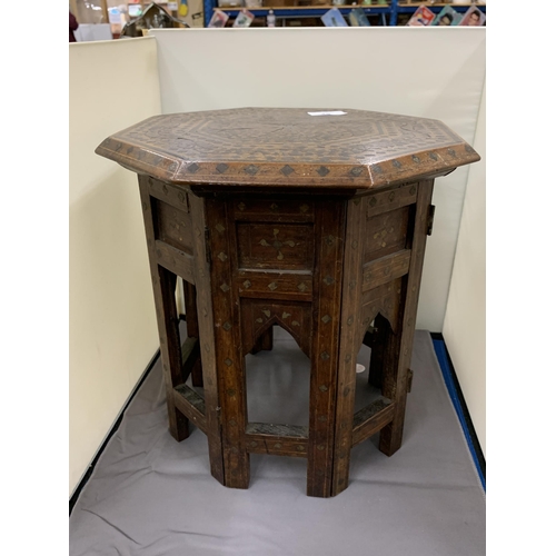 48 - A LATE 19TH CENTURY INDIAN OCTAGONAL TABLE WITH BRASS INLAY