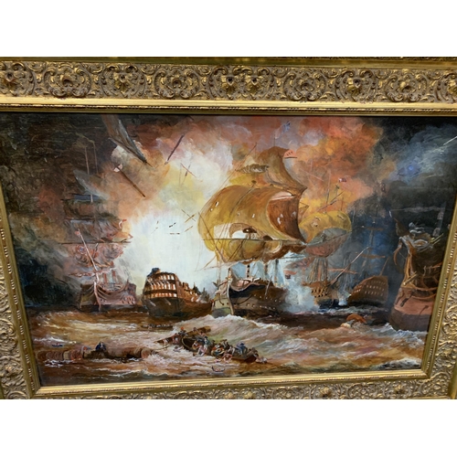 55 - A GILT FRAMED OIL ON BOARD OF A GALLEON BATTLE SCENE