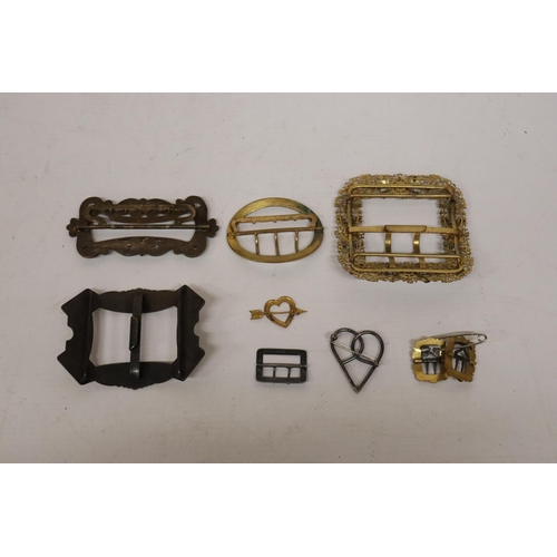 66 - A COLLECTION OF VINTAGE METAL AND ENAMEL BELT BUCKLES