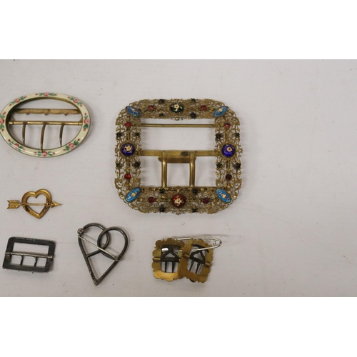 66 - A COLLECTION OF VINTAGE METAL AND ENAMEL BELT BUCKLES